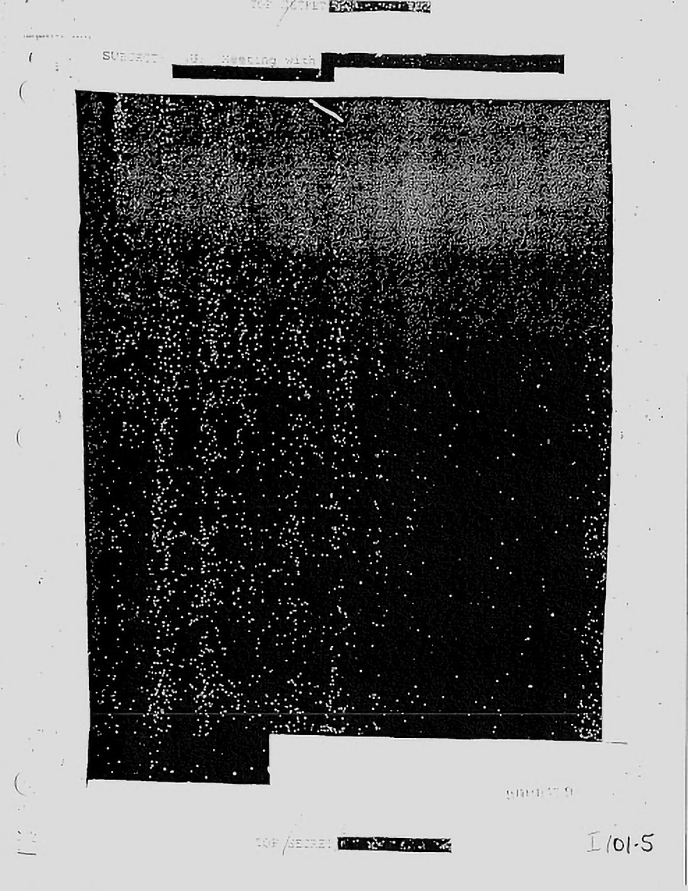 A scan of a paper document with the entirety of the content redacted with thick black lines'.